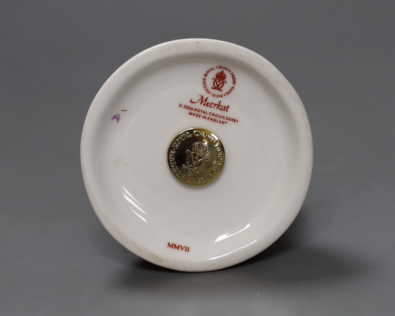 A Royal Crown Derby paperweight - Meerkat, gold stopper, boxed, no certificate.
